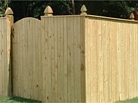 <b>Vertical Board Wood Privacy Fence with French Gothic Posts and a single walk gate</b>